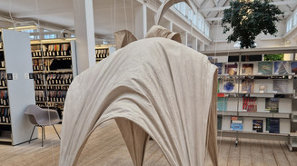 Shell structure hanging from the ceiling 