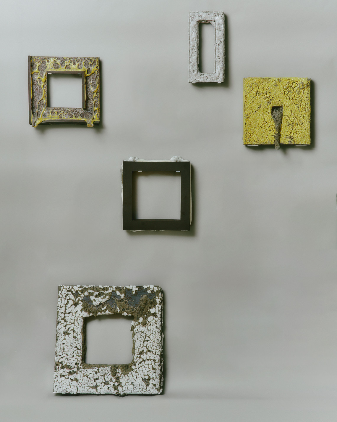 final pieces hanged on a wall, 5 objects, analogue picture