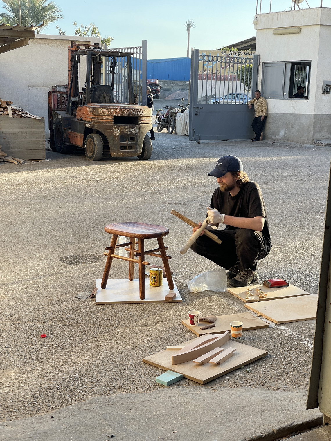 Wooden stool, student outside