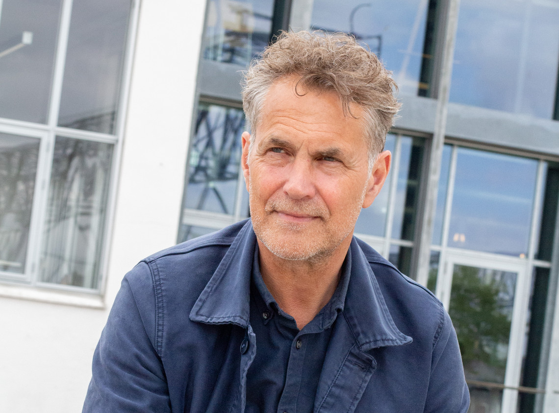 Nicolai de Gier in front of window