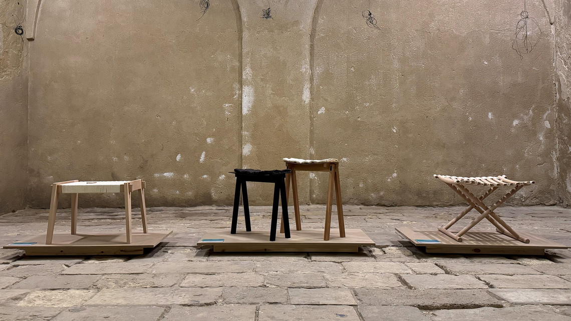 Four wooden stools