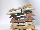 A color palette of stacked clay test, made from using waste resources . New aesthetics , tactility and expression. 