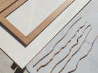 Lasercut tools in wood, used for making and designing the cladding. 