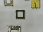 final pieces hanged on a wall, 5 objects, analogue picture