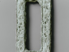 white bubbly glaze over a rectangular object