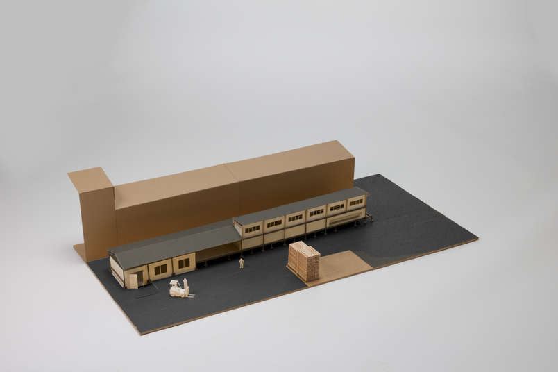 Scale model of a wood workshop.