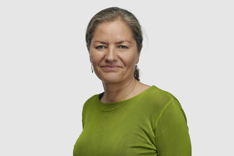Woman wearing a green blouse