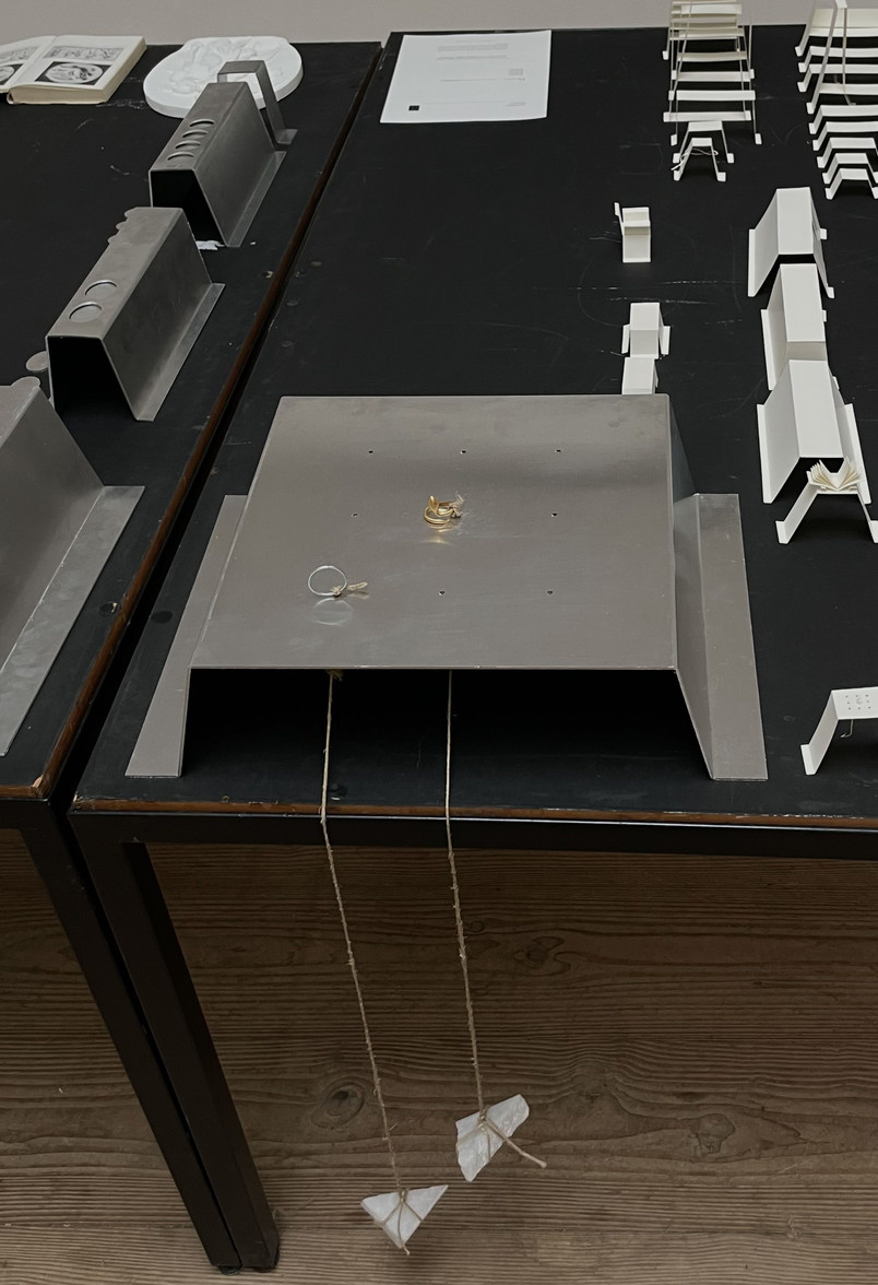 PROTOTYPE . DISPLAY FOR THORVALDSENS RING . SECURED BY ROPE & MARBLE STONE