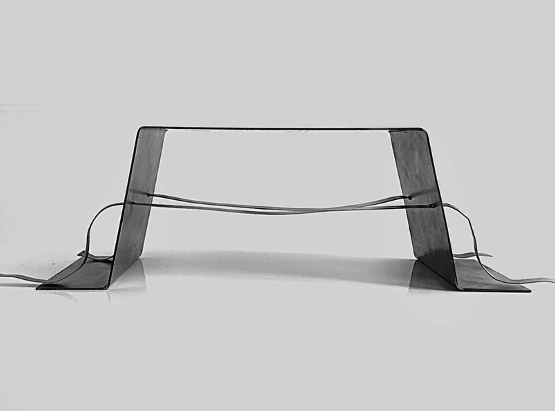 SCALE MODEL . A STEEL BENCH . ORIGINATING FROM THE PORTIKUS MOTIF  