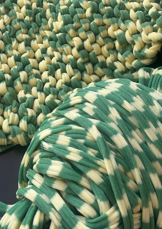 Digitally knitted yarn, reknitted