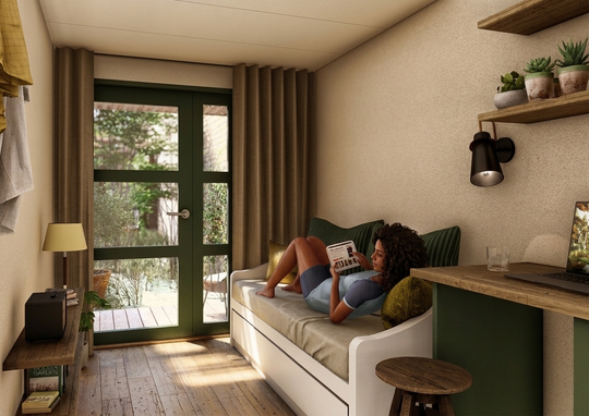 : Rendering of a compact room with a bed, desk and green garden doors.