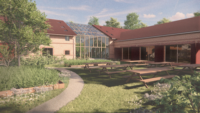 Rendering af hus på græsplæne og med vegetation