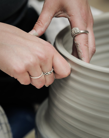 Close up: throwing on the wheel