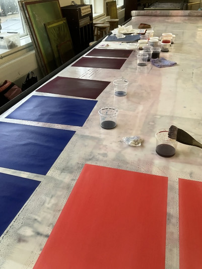 Production of hand-painted color samples for experimenting with color interactions on a larger scale.