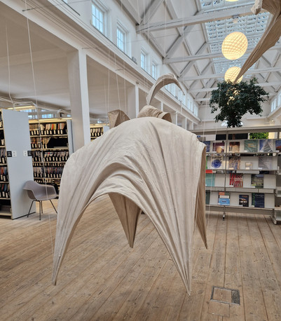 Shell structure hanging from the ceiling 
