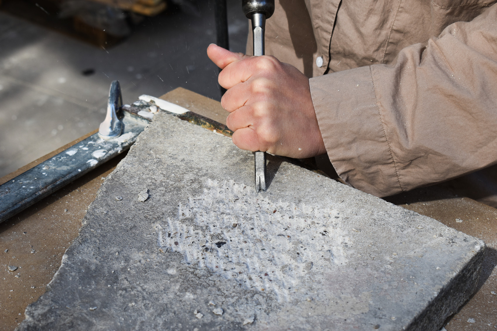 Working with traditional stonemason tools