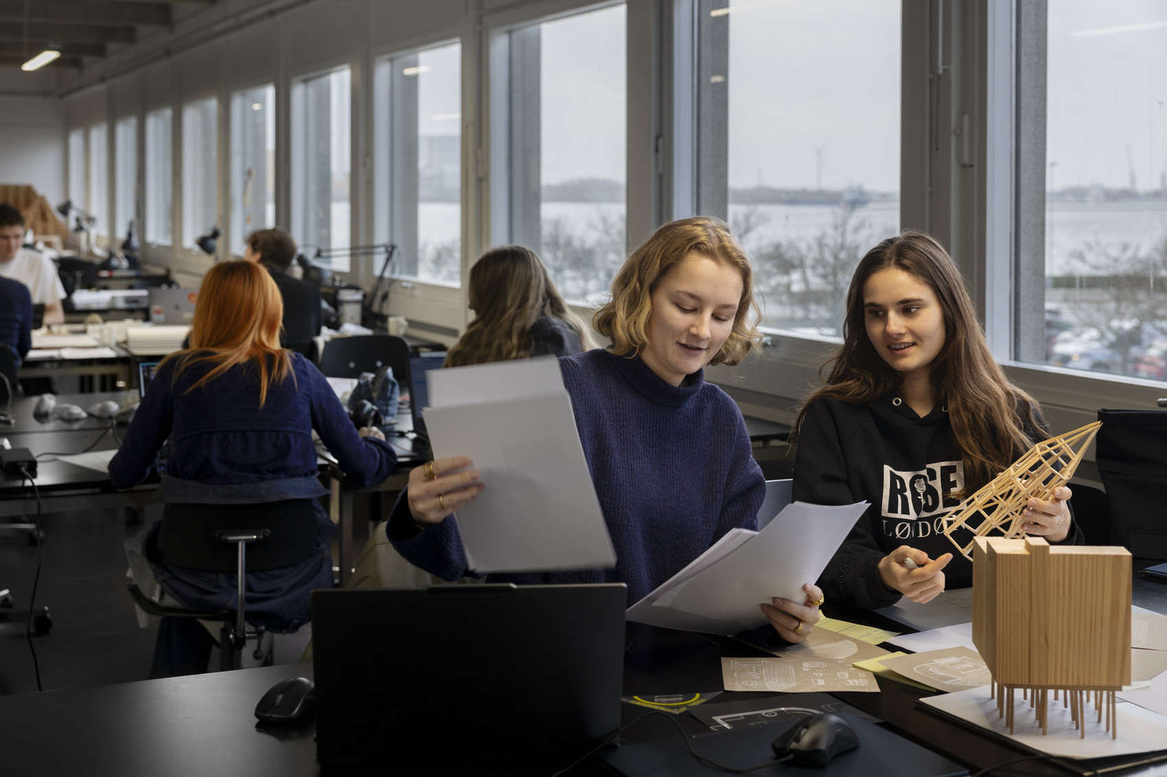 Two students at their desk
