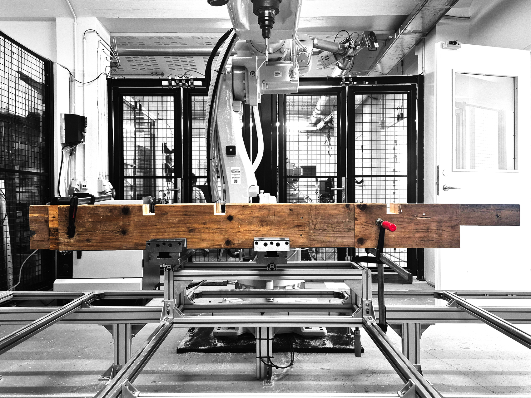 Image of a beam fabricated using segments of reclaimed formwork timber